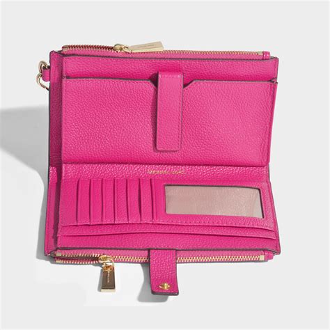 michael kors wristlet pink|Michael Kors oversized wallet.